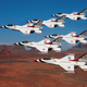 Illustration for article titled Watch seven jets landing in perfect formation